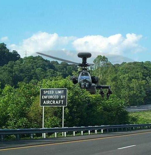funny-picture-speed-limit-enforced-by-aircraft-apache-attack-helicopter.jpg